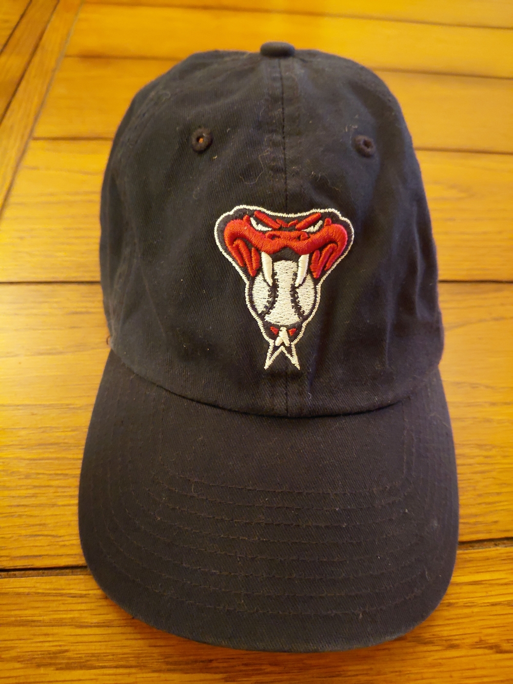 47 Black Baseball Cap with Red and White Snake Patch